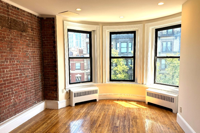 Living Room - Sunny 1 Bedroom in Back Bay with Bay Windows and Exposed Brick