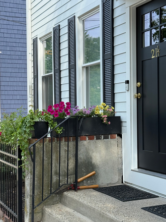 front porch - Sunny, renovated apt in condo bldg w/yard, just off Beacon St on Cambridge line