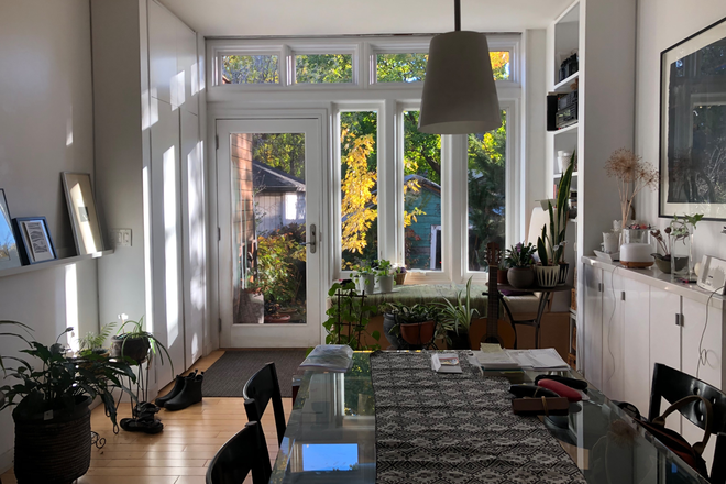 Dining and rear exit - Furnished bedroom in bright two 2 bedroom Annex apartment in a house, laundry, Internet,