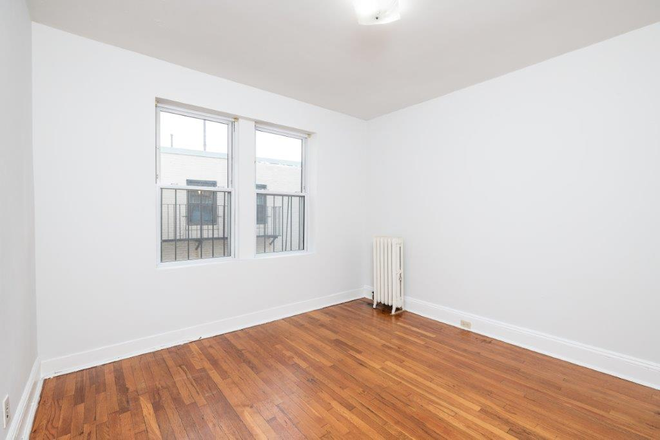 Visit hubrealtyproperties.com - Mission Hill, Sunny 2 bedroom with renovated kitchen and bathroom, free month rent Apartments