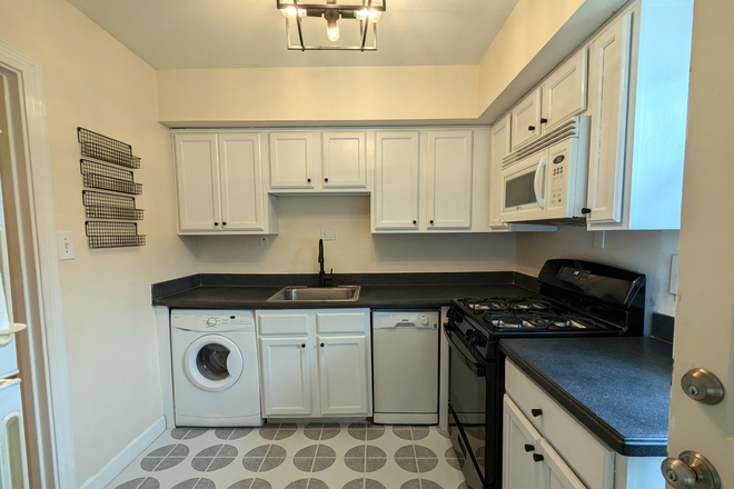 Kitchen with all major appliances including dishwasher, clothes washer, dryer, microwave, range - Top Floor Condo, Quiet Complex, Emory Shuttle Out Front, Walk to Amenities!