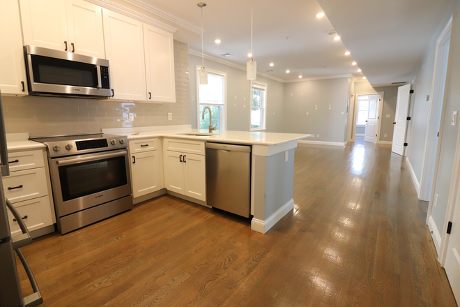 Kitchen/Living - NEW CONSTRUCTION! Fantastic Modern Apartments with In-Unit Laundry & Off-Street Parking