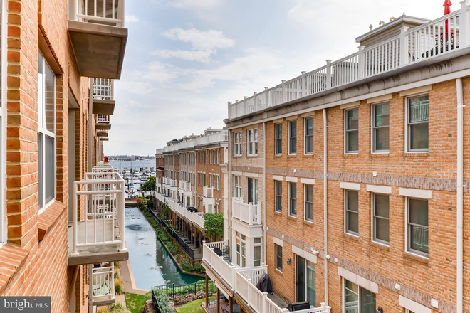 View from balcony looking left. - Furnished 1bed/1bath unit in waterfront condo Federal Hill