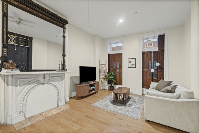 Fireplace+Living Room - Fully Furnished Brownstone in Safe & Welcoming Neighborhood Apartments