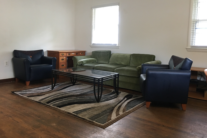 Living room at main floor - Entire house with 5 bedrooms and 2 bathrooms