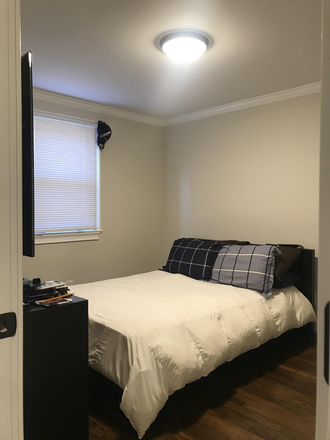 Hub Realty - Newly renovated 3 bedroom with laundry in unit, on 57 bus Apartments