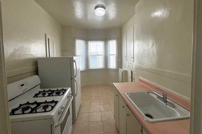 kitchen - Great Deal! Just 1 block from Campus!! ~Off-street, Parking available Apartments