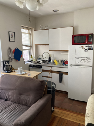 Kitchen - One Bedroom Sunny  and bright in Symphony Rd walk to Campus No FEE Apartments