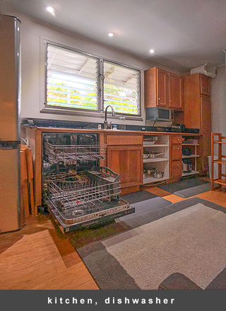 Kitchen facing the Tradewinds, DW, marble counter, induction cooktop - Furn.1br Kåne`ohe Apt. - near HIMB Moku O Lo`e ,, W/D,, skylights