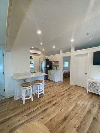 Kitchen/living room area - Newly remodeled Cozy Cottage, fully furnished water included