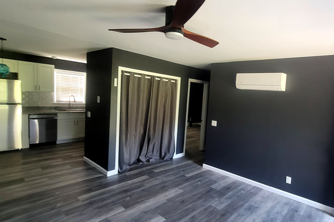 Living Room and hallway - Newly Remodeled & Private Intown Dahlonega Apartment – Walk to UNG & The Square!