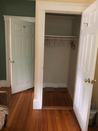yr  bedroom closet with door leading to livingroom - LOVELY JP CONDO TO SHARE $1400/MO inc util