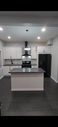 Kitchen - Newly renovated apartment close to train station, downtown, seaport, and South Bay