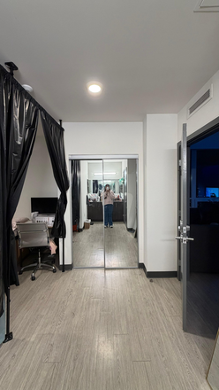 Closet with attached mirror - Lightview Apartments