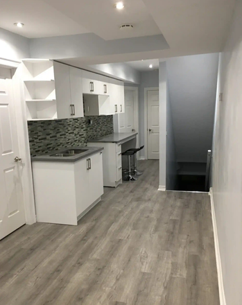 Kitchen (which is now furnished) - 2 Bedrooms Available in a 4 Bedroom, 2 Bathroom unit in Chinatown, utilities included.