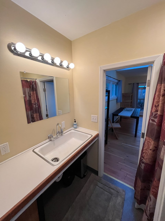 Looking from bathroom to main room. - Cabin Atelier Apartments