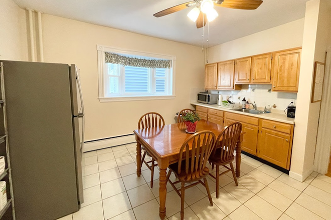 Updated Furnished kitchen with large bay windows - Furnished Spacious Bedroom | Longwood Medical Area  | Available 9/1 | Female Only Home