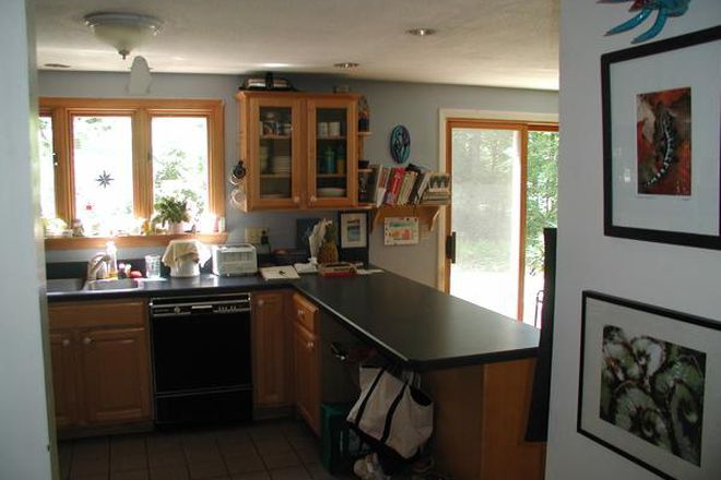 Kitchen from entranceway near mudroom - Comfy, bright, furnished 3BR home on bus line