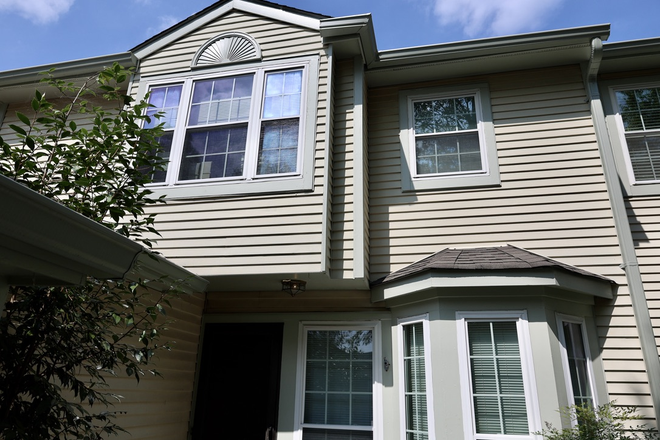 Outside street view (garage at left, one bedroom visible above) - Room in shared 3BR thome-Towpath Ct-Princeton