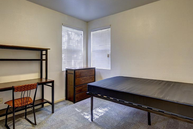 Bedroom comes furnished with bed, desk, drawer, and full size closet - ACC Apartment near UCI