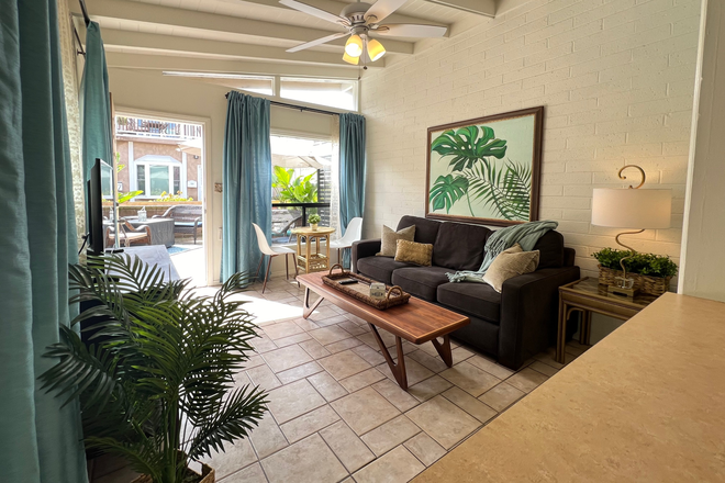 Living Room with open beam ceiling - South Mission Surf Side Cottage