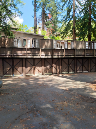 1. Exterior from carport with deck and storage units under deck - $5,525 / 3br/2bath house with huge patio - UCB northside Campus House for Rent (berkeley)