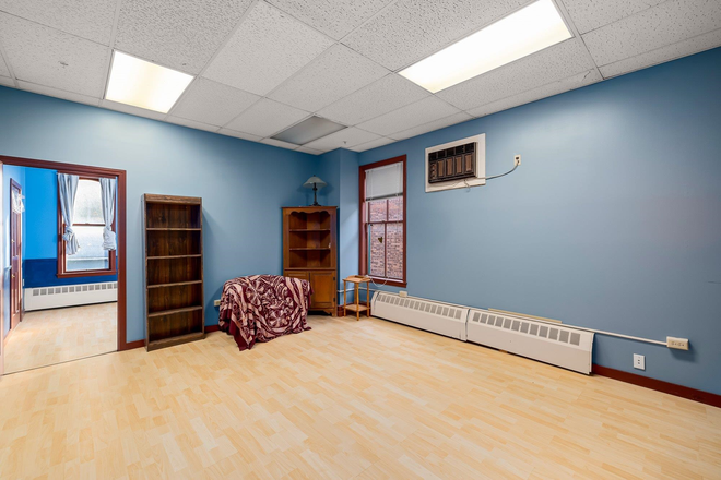 Living Room - Perfect location/Historic Building 2 Bedroom Unit on Main Street in Bethel, VT Apartments