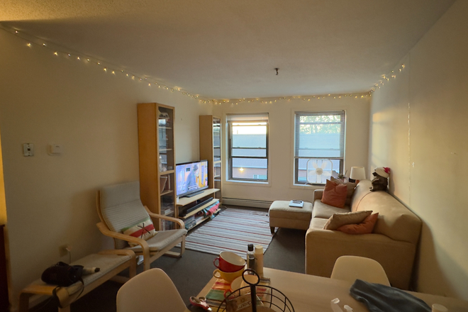Living room/common space (#2) - The Champlain School Apartments (Rieley Properties)