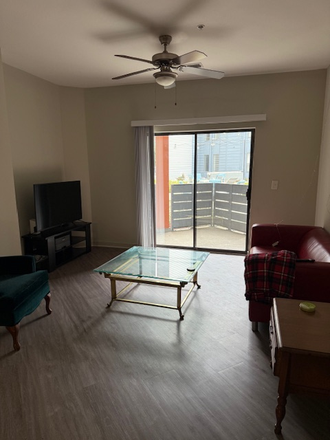 Common Area with Balcony - Olympus Midtown Apartments