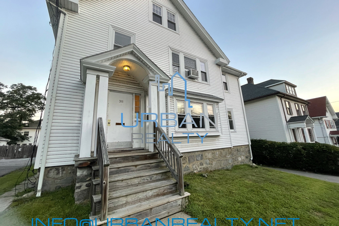 EXTERIOR - **RENTING 2026-2027**  LARGE 8 BED 3.5 BATH  HOUSE ON FOSTER ST- LIVING ROOM, YARD, BASEMENT  -