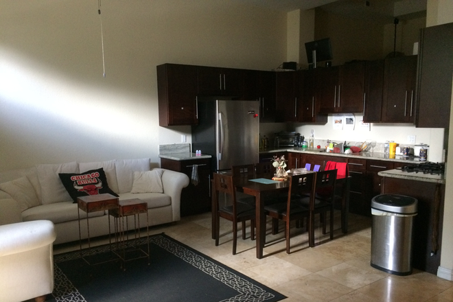 Kitchen and living room with vaulted ceilings - La Jolla Village Park, 1 block from UCSD, female communal living, private bedroom with shared bath