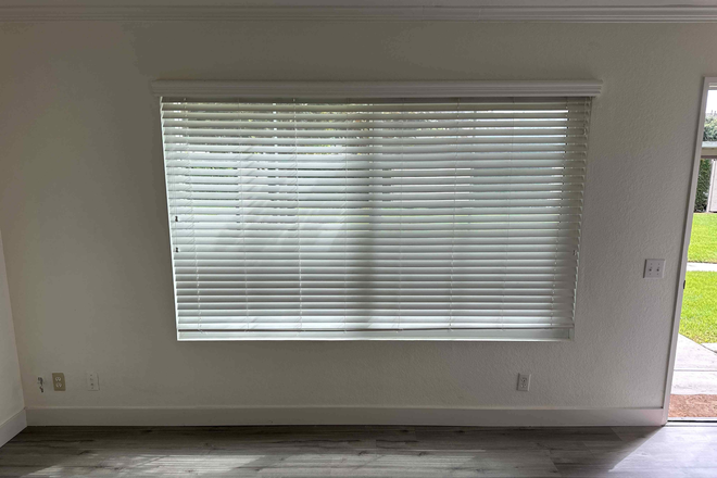 Downstairs Bedroom Before Move in and curtains - Columbia Square Apartments