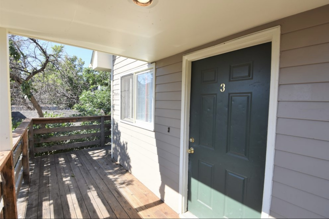 Front door/porch - House on the hill, close to campus.