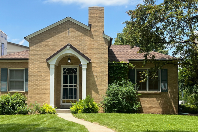Front Yard - Charming 4BR/2BA brick home with arched entryway located one block from DU. Available Sept 1, 2025
