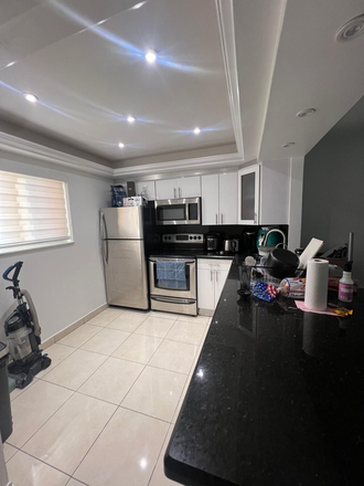 Kitchen - Village of Kings Creek Apartments in Kendall