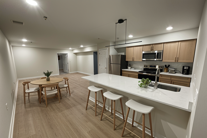 Kitchen (Note: Staged photos are digitally rendered and intended to illustrate how the unit may look furnished.) - 1204 Chestnut Apartments