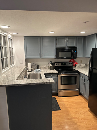 kitchen - 3 Bedroom on Hill w/ 2 garage parking spots; (unit 105) all new updates in 2025
