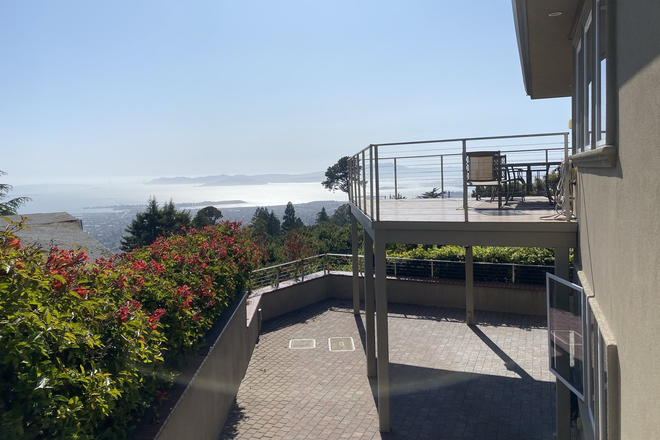 Patio area (lower area is with rental) - 2-Bedroom perched in the Hills Overlooking the Bay