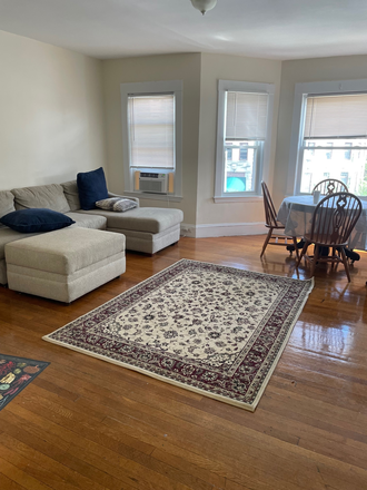 living room - HUGE 4 Bedroom apt.in a great BC building! Parking,2 baths, walk to class! Great price! NO FEE!