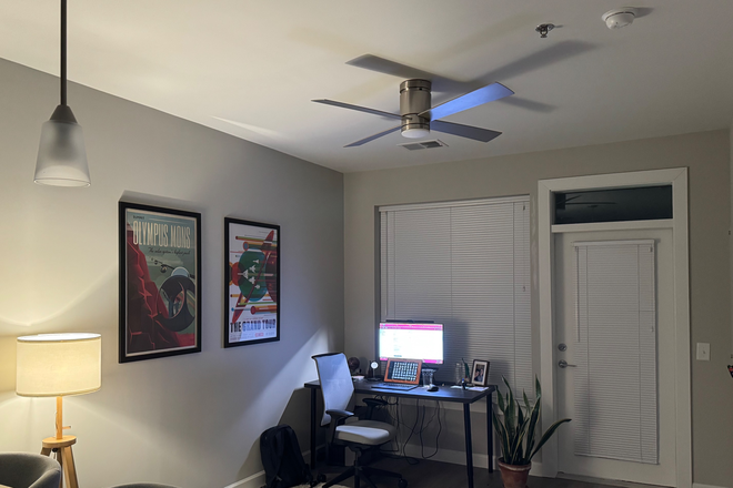 Kitchen bar in foreground with living room - Entire 1 bedroom at Vue, Winter through Summer Apartments