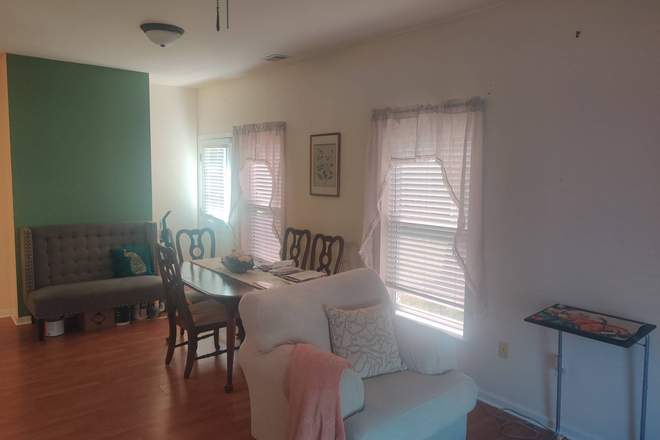 Living/Dining Area - Rooms at Pocahontas Square Townhome