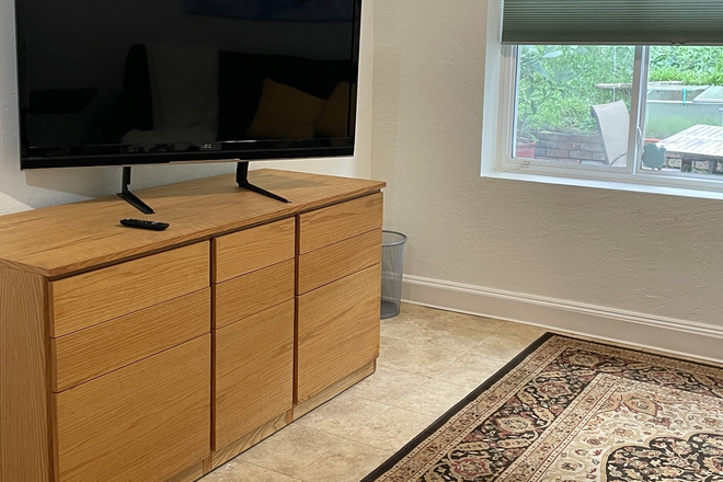 TV and Dresser (plus armoire) - Private Ground-Level Studio near Public Transit, Shopping, & Nature  (Minimum: 3 month lease) House