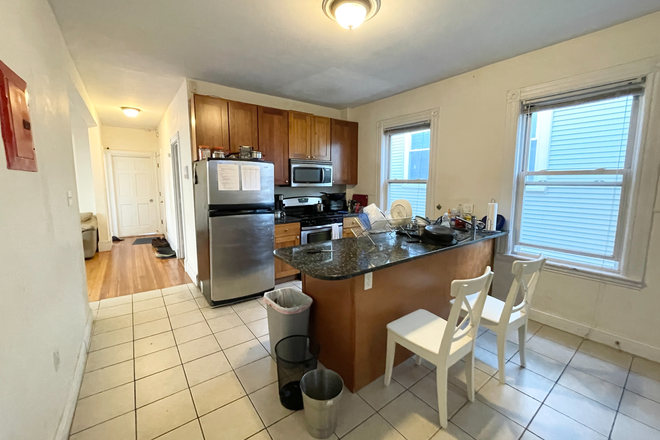 Kitchen - Large 4 Bedroom in Mission Hill! Stainless steel appliance and Laundry Apartments