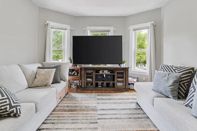 Living room 1/2 - 1 Bed Available in 5-bed 2-bath on 282 Boston Ave, Unit 2