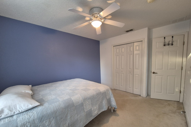 Bedroom closet - Beautiful Townhouse near shopping, restaurants, and transportation.