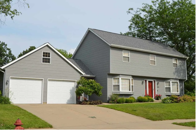 Exterior / Street View - 4BR/2.5BA Two-Story Home | West Side Iowa City | 2-Car Garage