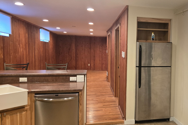 Living/Dining Room with hardwood floors - DU Neighborhood | Spacious 1,000 Sq Ft Basement Apartment w/ Private Entrance | Utilities included.