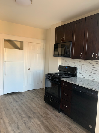 Kitchen - Student Housing Available in Historic Charles Village Townhome