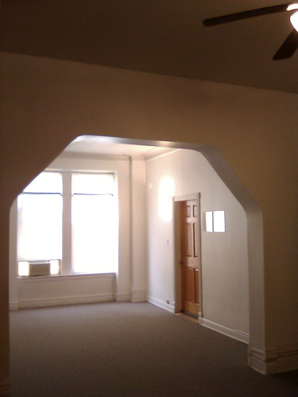 view dining to living room - WALK to West Campus! HUGE! Charming, quiet, clean with parking spot optional. Apartments