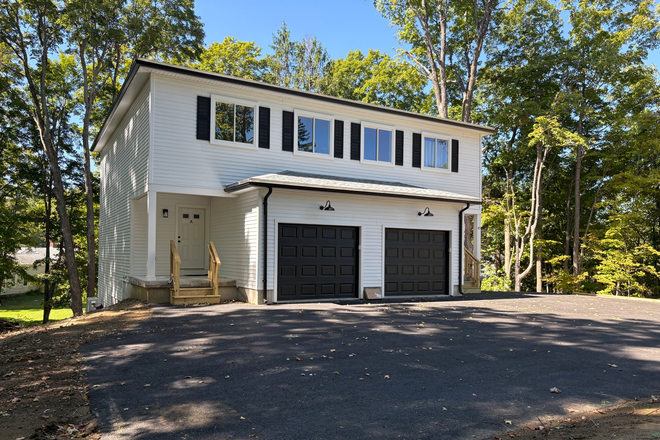 Exterior - Beautiful, brand new construction at Cushman Village. Duplex